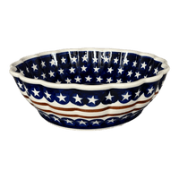 A picture of a Polish Pottery Zaklady Deep 9.5" Scalloped Bowl (Stars & Stripes) | Y1279A-D81 as shown at PolishPotteryOutlet.com/products/scalloped-9-5-bowl-stars-stripes-y1279a-d81