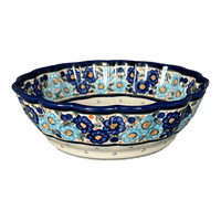 A picture of a Polish Pottery Zaklady Deep 9.5" Scalloped Bowl (Garden Party Blues) | Y1279A-DU50 as shown at PolishPotteryOutlet.com/products/scalloped-9-5-bowl-garden-party-blues-y1279a-du50