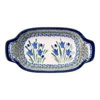 A picture of a Polish Pottery Zaklady 5.5" x 10" Small Baker With Handles (Blue Tulips) | Y1281A-ART160 as shown at PolishPotteryOutlet.com/products/baker-w-handles-blue-tulips-y1281a-art160