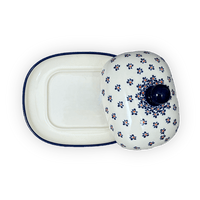 A picture of a Polish Pottery Large Zaklady Butter Dish (Falling Blue Daisies) | Y1394-A882A as shown at PolishPotteryOutlet.com/products/6-x-8-large-butterdish-falling-blue-daisies-y1394-a882a