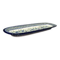 A picture of a Polish Pottery Zaklady 17.5" x 6" Oval Platter (Blue Tulips) | Y1430A-ART160 as shown at PolishPotteryOutlet.com/products/medium-oval-tray-blue-tulips-y1430a-art160