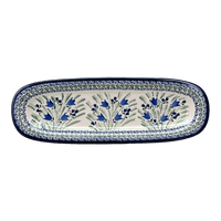 A picture of a Polish Pottery Zaklady 17.5" x 6" Oval Platter (Blue Tulips) | Y1430A-ART160 as shown at PolishPotteryOutlet.com/products/medium-oval-tray-blue-tulips-y1430a-art160