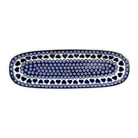 A picture of a Polish Pottery Zaklady 17.5" x 6" Oval Platter (Swirling Hearts) | Y1430A-D467 as shown at PolishPotteryOutlet.com/products/17-5-x-6-oval-platter-swirling-hearts-y1430a-d467
