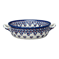 A picture of a Polish Pottery Zaklady Small Round Casserole W/Handles (Falling Blue Daisies) | Y1454A-A882A as shown at PolishPotteryOutlet.com/products/7-5-round-stew-dish-falling-blue-daisies-y1454a-a882a