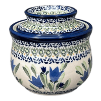 A picture of a Polish Pottery Zaklady Butter Crock (Blue Tulips) | Y1512-ART160 as shown at PolishPotteryOutlet.com/products/zaklady-butter-crock-blue-tulips-y1512-art160