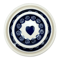 A picture of a Polish Pottery Zaklady Butter Crock (Swirling Hearts) | Y1512-D467 as shown at PolishPotteryOutlet.com/products/butter-crock-swirling-hearts-y1512-d467