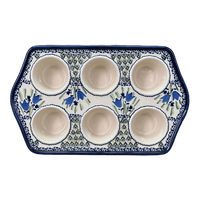 A picture of a Polish Pottery Zaklady Muffin Pan (Blue Tulips) | Y1778-ART160 as shown at PolishPotteryOutlet.com/products/zaklady-muffin-pan-blue-tulips-y1778-art160