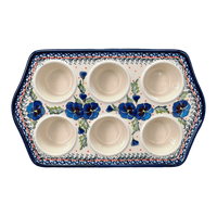 A picture of a Polish Pottery Zaklady Muffin Pan (Pansies in Bloom) | Y1778-ART277 as shown at PolishPotteryOutlet.com/products/zaklady-muffin-pan-pansies-in-bloom-y1778-art277
