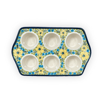 A picture of a Polish Pottery Zaklady Muffin Pan (Sunny Meadow) | Y1778-ART332 as shown at PolishPotteryOutlet.com/products/muffin-pan-sunny-meadow-y1778-art332