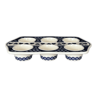 A picture of a Polish Pottery Zaklady Muffin Pan (Swirling Hearts) | Y1778-D467 as shown at PolishPotteryOutlet.com/products/muffin-pan-swirling-hearts-y1778-d467