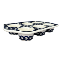 A picture of a Polish Pottery Zaklady Muffin Pan (Peacock Burst) | Y1778-D487 as shown at PolishPotteryOutlet.com/products/zaklady-muffin-pan-peacock-burst-y1778-d487