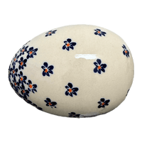A picture of a Polish Pottery Zaklady 4.5 " Painted Egg (Falling Blue Daisies) | Y1807O2-A882A as shown at PolishPotteryOutlet.com/products/4-5-painted-egg-falling-blue-daisies-y1807o2-a882a