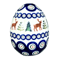 A picture of a Polish Pottery Zaklady 4.5 " Painted Egg (Evergreen Moose) | Y1807O2-A992A as shown at PolishPotteryOutlet.com/products/4-5-painted-egg-reindeer-peacock-y1807o2-a992a