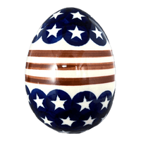 A picture of a Polish Pottery Zaklady 4.5 " Painted Egg (Stars & Stripes) | Y1807O2-D81 as shown at PolishPotteryOutlet.com/products/4-5-painted-egg-stars-stripes-y1807o2-d81