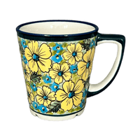 A picture of a Polish Pottery Zaklady 14 oz. Tulip Mug (Sunny Meadow) | Y1920-ART332 as shown at PolishPotteryOutlet.com/products/14-oz-tulip-mug-sunny-meadow-y1920-art332