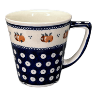 A picture of a Polish Pottery 14 oz. Tulip Mug (Persimmon Dot) | Y1920-D479 as shown at PolishPotteryOutlet.com/products/tulip-mug-peacock-peaches-cream-y1920-d479