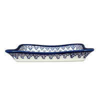 A picture of a Polish Pottery Zaklady Angular Serving Dish (Falling Blue Daisies) | Y1935A-A882A as shown at PolishPotteryOutlet.com/products/10-x-7-angular-serving-dish-falling-blue-daisies-y1935a-a882a
