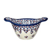 A picture of a Polish Pottery Zaklady Small Bowl W/Handles (Falling Blue Daisies) | Y1971A-A882A as shown at PolishPotteryOutlet.com/products/3-5-small-bowl-w-handles-falling-blue-daisies-y1971a-a882a