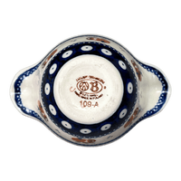 A picture of a Polish Pottery Bowl, Round, Handles, 3.5" Small in "Persimmon Dot" by Zaklady | Y1971A-D479 as shown at PolishPotteryOutlet.com/products/surprise-bowl-peacock-peaches-cream-y1971a-d479