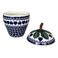 A picture of a Polish Pottery Zaklady Strawberry Canister (Swirling Hearts) | Y1873-D467 as shown at PolishPotteryOutlet.com/products/8-strawberry-canister-swirling-hearts-y1873-d467