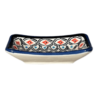 A picture of a Polish Pottery Zaklady Tiny Rectangular Sauce Dish (Beaded Turquoise) | Y2024-DU203 as shown at PolishPotteryOutlet.com/products/3-75-x-2-75-tiny-rectangular-sauce-dish-beaded-turquoise-y2024-du203