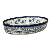 A picture of a Polish Pottery 11" x 7.5" Oval Baker (Blue Tulips) | Y349A-ART160 as shown at PolishPotteryOutlet.com/products/11-oval-baker-blue-tulips-y349a-art160