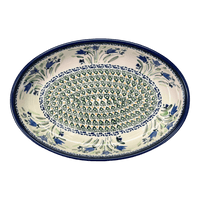 A picture of a Polish Pottery Zaklady 11" x 7.5" Oval Baker (Blue Tulips) | Y349A-ART160 as shown at PolishPotteryOutlet.com/products/11-oval-baker-blue-tulips-y349a-art160