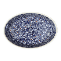 A picture of a Polish Pottery Zaklady 11" x 7.5" Oval Baker (Ditsy Daisies) | Y349A-D120 as shown at PolishPotteryOutlet.com/products/11-x-7-5-oval-baker-ditsy-daisies-y349a-d120