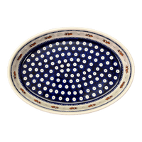 A picture of a Polish Pottery Zaklady 11" x 7.5" Oval Baker (Persimmon Dot) | Y349A-D479 as shown at PolishPotteryOutlet.com/products/11-x-7-5-oval-baker-persimmon-dot-y349a-d479