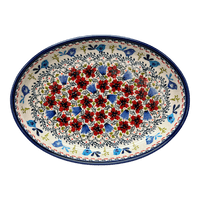 A picture of a Polish Pottery Zaklady 12.25" Oval Baker (Circling Bluebirds) | Y350A-ART214 as shown at PolishPotteryOutlet.com/products/12-25-oval-baker-circling-bluebirds-y350a-art214