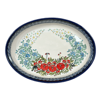 A picture of a Polish Pottery Zaklady 12.25" Oval Baker (Floral Crescent) | Y350A-ART237 as shown at PolishPotteryOutlet.com/products/12-25-oval-baker-fields-of-flowers-y350a-art237