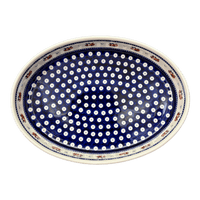 A picture of a Polish Pottery Zaklady 12.25" Oval Baker (Persimmon Dot) | Y350A-D479 as shown at PolishPotteryOutlet.com/products/12-25-oval-baker-persimmon-dot-y350a-d479