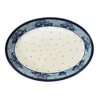 A picture of a Polish Pottery Zaklady 12.25" Oval Baker (Garden Party Blues) | Y350A-DU50 as shown at PolishPotteryOutlet.com/products/12-25-oval-baker-garden-party-blues-y350a-du50