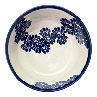A picture of a Polish Pottery 6" Magnolia Bowl (Blue Floral Vines) | Y833A-D1210A as shown at PolishPotteryOutlet.com/products/6-25-magnolia-bowl-blue-floral-vines-y833a-d1210a