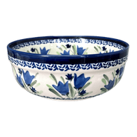 A picture of a Polish Pottery Zaklady 7.25" Magnolia Bowl (Blue Tulips) | Y834A-ART160 as shown at PolishPotteryOutlet.com/products/7-25-magnolia-bowl-blue-tulips-y834a-art160