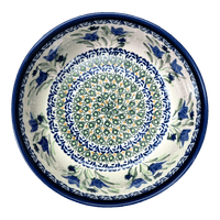 A picture of a Polish Pottery Zaklady 7.25" Magnolia Bowl (Blue Tulips) | Y834A-ART160 as shown at PolishPotteryOutlet.com/products/7-25-magnolia-bowl-blue-tulips-y834a-art160