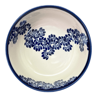 A picture of a Polish Pottery 7.25" Magnolia Bowl (Blue Floral Vines) | Y834A-D1210A as shown at PolishPotteryOutlet.com/products/7-25-magnolia-bowl-blue-floral-vines-y834a-d1210a