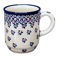 A picture of a Polish Pottery Zaklady 8 oz. Traditional Mug (Falling Blue Daisies) | Y903-A882A as shown at PolishPotteryOutlet.com/products/8-oz-traditional-mug-falling-blue-daisies-y903-a882a