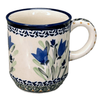 A picture of a Polish Pottery Zaklady 8 oz. Traditional Mug (Blue Tulips) | Y903-ART160 as shown at PolishPotteryOutlet.com/products/zaklady-traditional-mug-blue-tulips-y903-art160