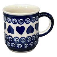 A picture of a Polish Pottery Zaklady 8 oz. Traditional Mug (Swirling Hearts) | Y903-D467 as shown at PolishPotteryOutlet.com/products/8-oz-traditional-mug-swirling-hearts-y903-d467