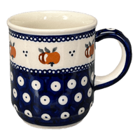 A picture of a Polish Pottery Zaklady 8 oz. Traditional Mug (Persimmon Dot) | Y903-D479 as shown at PolishPotteryOutlet.com/products/zaklady-traditional-mug-peacock-peaches-cream-y903-d479