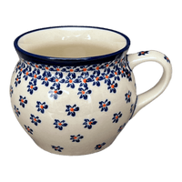A picture of a Polish Pottery Zaklady 16 oz. Large Belly Mug (Falling Blue Daisies) | Y910-A882A as shown at PolishPotteryOutlet.com/products/16-oz-large-belly-mug-falling-blue-daisies-y910-a882a
