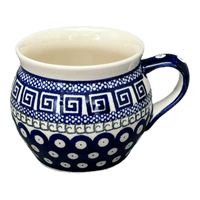 A picture of a Polish Pottery Zaklady 16 oz. Large Belly Mug (Grecian Dot) | Y910-D923 as shown at PolishPotteryOutlet.com/products/16-oz-large-belly-mug-geometric-peacock-y910-d923