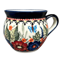 A picture of a Polish Pottery Zaklady 10 oz. Belly Mug (Butterfly Bouquet) | Y911-ART149 as shown at PolishPotteryOutlet.com/products/zaklady-10-oz-belly-mug-butterfly-bouquet-y911-art149