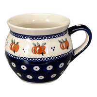 A picture of a Polish Pottery Zaklady 10 oz. Belly Mug (Persimmon Dot) | Y911-D479 as shown at PolishPotteryOutlet.com/products/zaklady-10-oz-belly-mug-peacock-peaches-cream-y911-d479