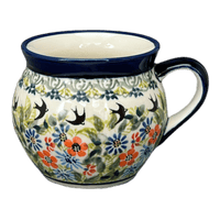 A picture of a Polish Pottery Zaklady 10 oz. Belly Mug (Floral Swallows) | Y911-DU182 as shown at PolishPotteryOutlet.com/products/10-oz-belly-mug-du182-y911-du182