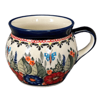 A picture of a Polish Pottery Zaklady 16 oz. Large Belly Mug (Butterfly Bouquet) | Y910-ART149 as shown at PolishPotteryOutlet.com/products/zaklady-16-oz-belly-mug-butterfly-bouquet-y910-art149
