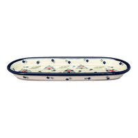 A picture of a Polish Pottery Zaklady 11" x 4.5" Oval Serving Dish (Mountain Flower) | Y928A-A1109A as shown at PolishPotteryOutlet.com/products/small-tray-mistletoe-y928a-a1109a