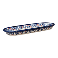 A picture of a Polish Pottery Zaklady 11" x 4.5" Oval Serving Dish (Falling Blue Daisies) | Y928A-A882A as shown at PolishPotteryOutlet.com/products/11-25-x-4-5-oval-serving-dish-falling-blue-daisies-y928a-a882a