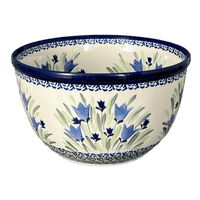 A picture of a Polish Pottery Zaklady Extra-Deep 8" Bowl (Blue Tulips) | Y985A-ART160 as shown at PolishPotteryOutlet.com/products/zaklady-8-bowl-blue-tulips-y985a-art160